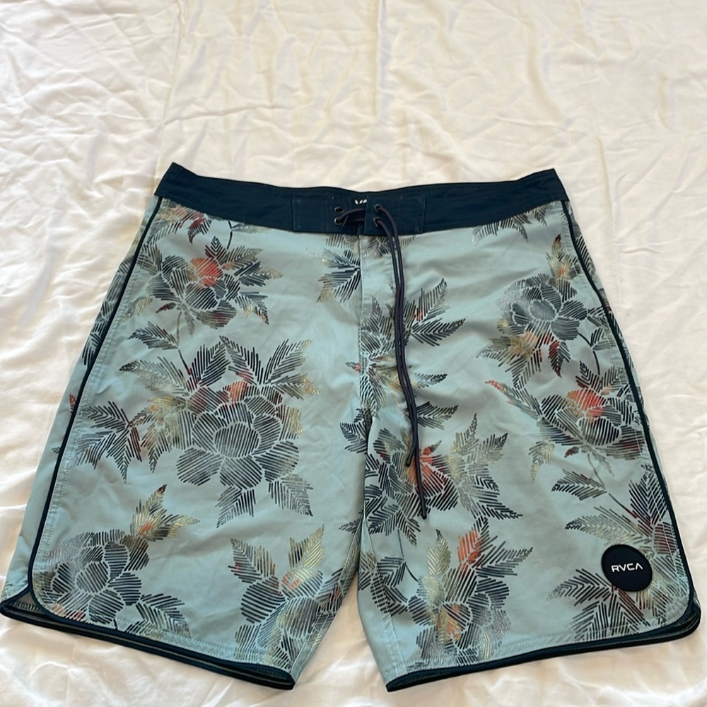RVCA board shorts. Blue with dark rainbow flowers